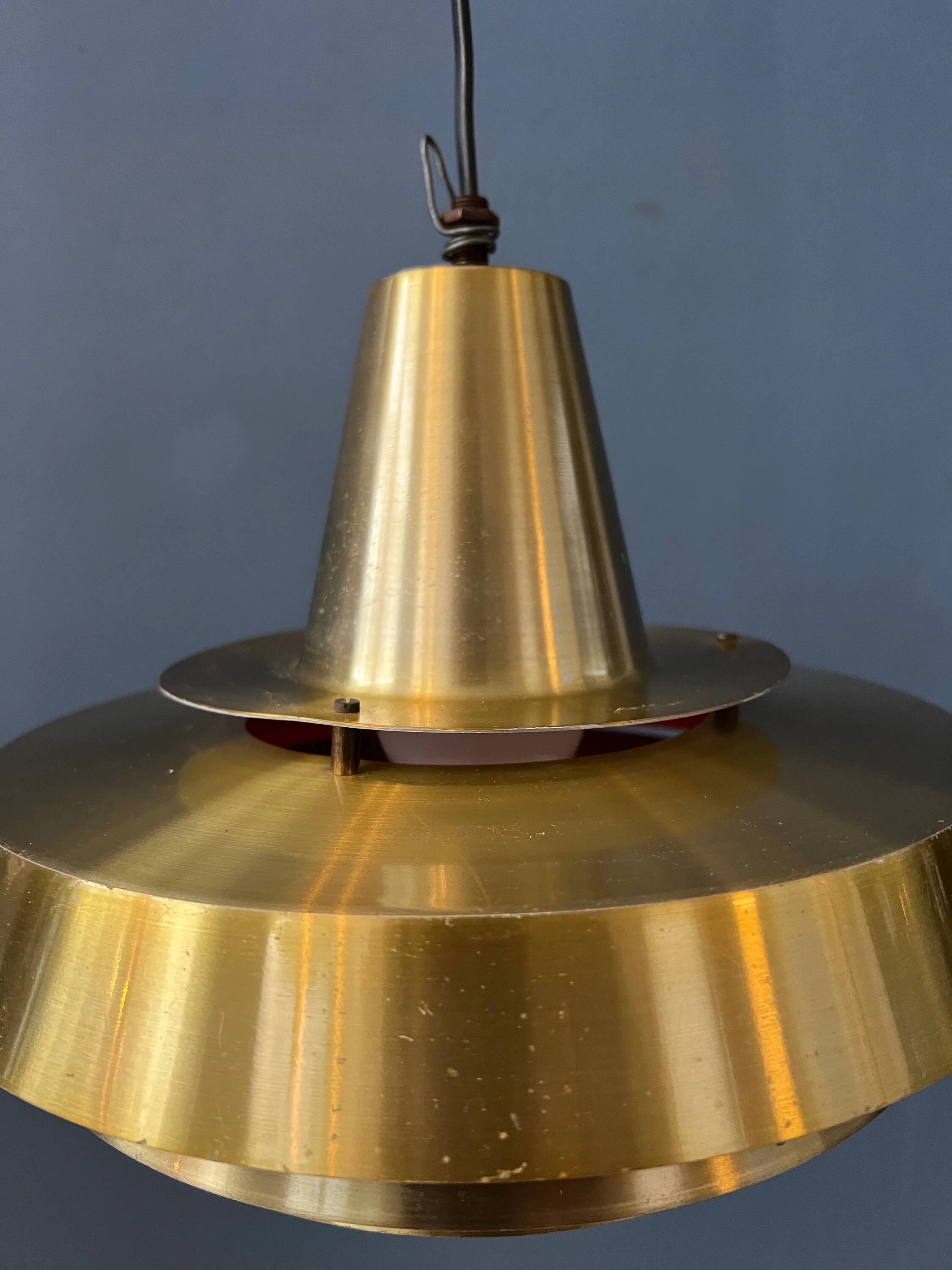 Mid-century Danish style orange brass suspension light.