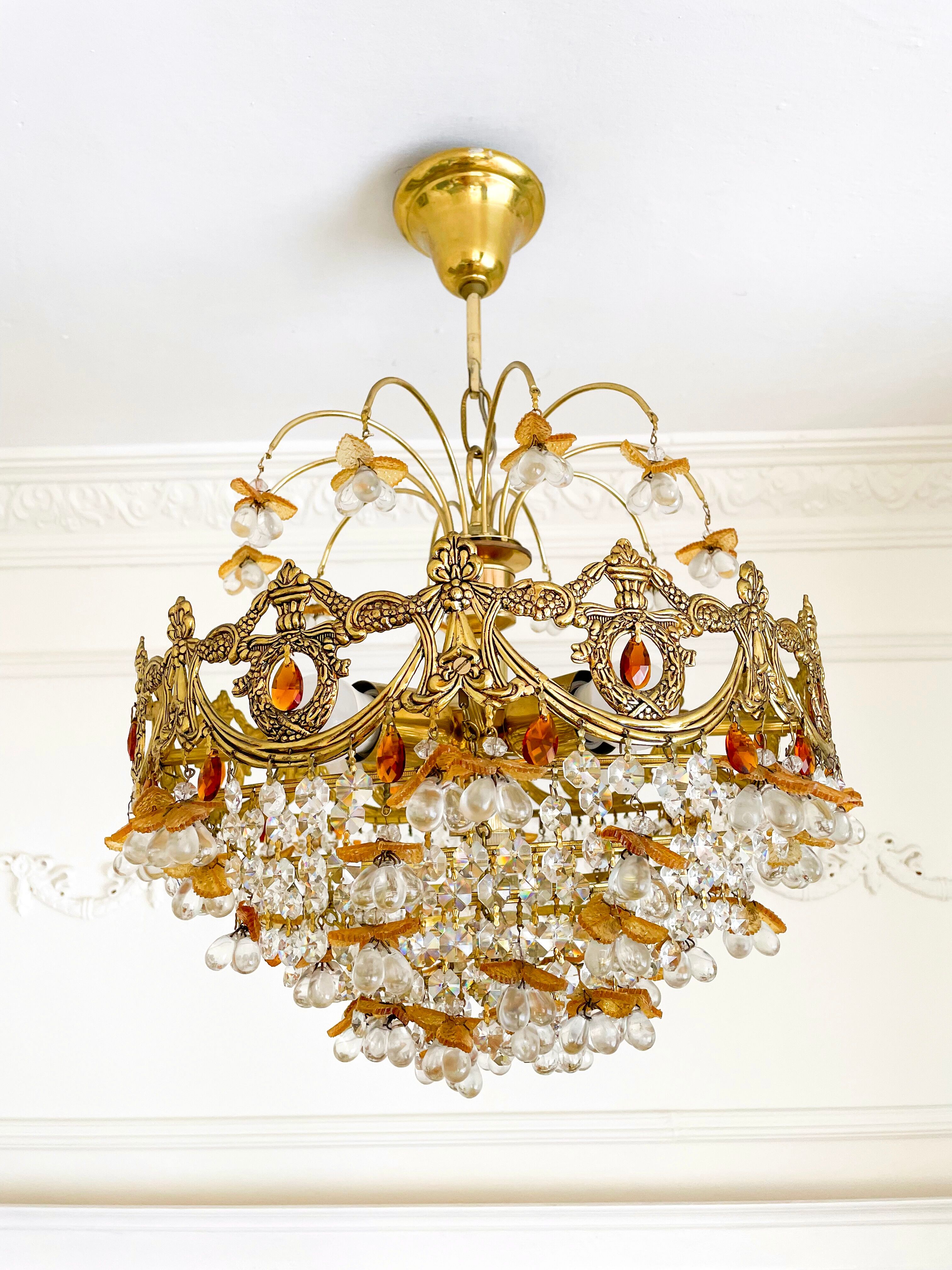 Exceptional vintage chandelier in Murano style crystal, orange, brass.
