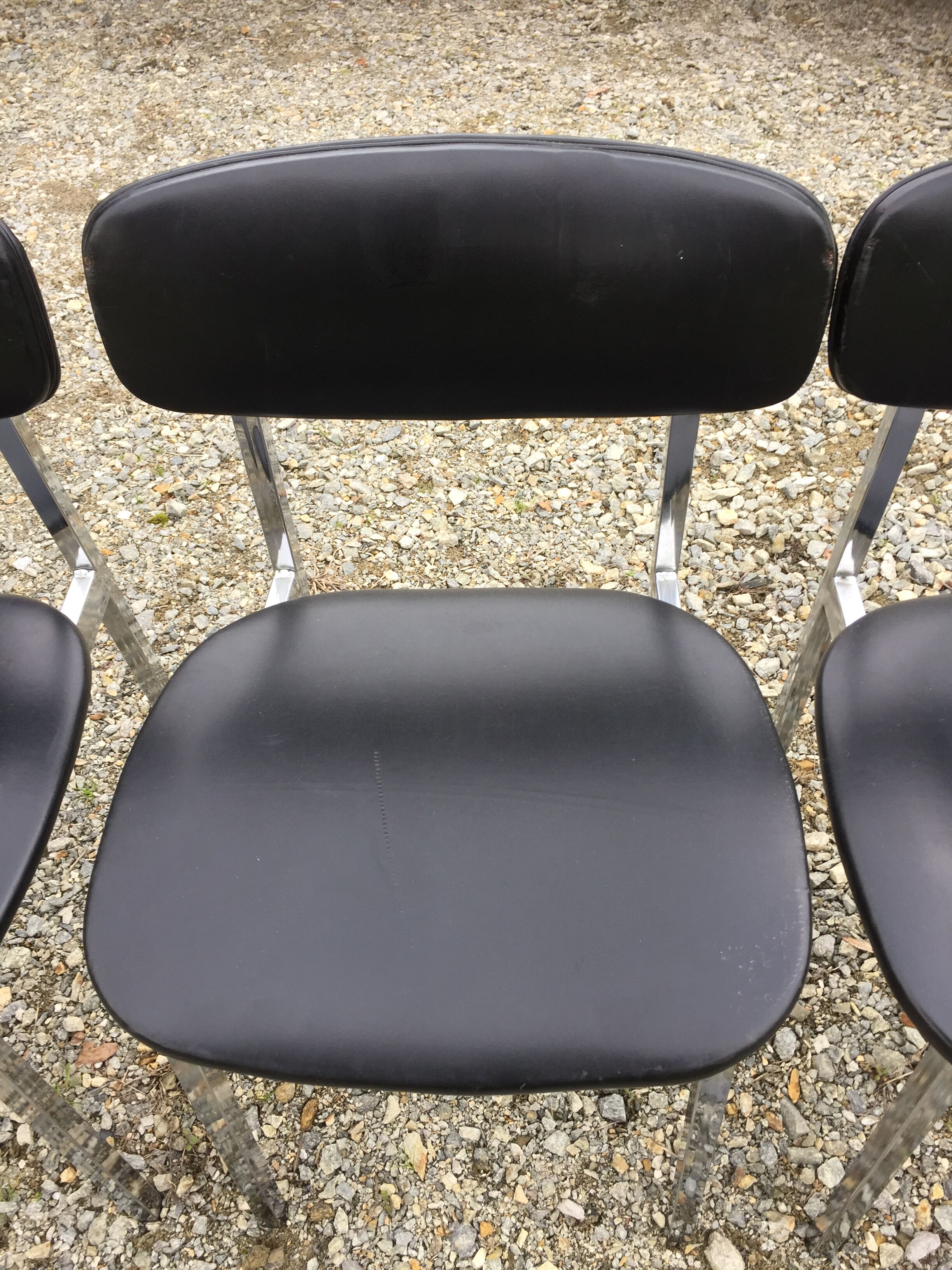 6 vintage chairs in black skaï with chrome metal tubular base.
