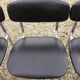 6 vintage chairs in black skaï with chrome metal tubular base.