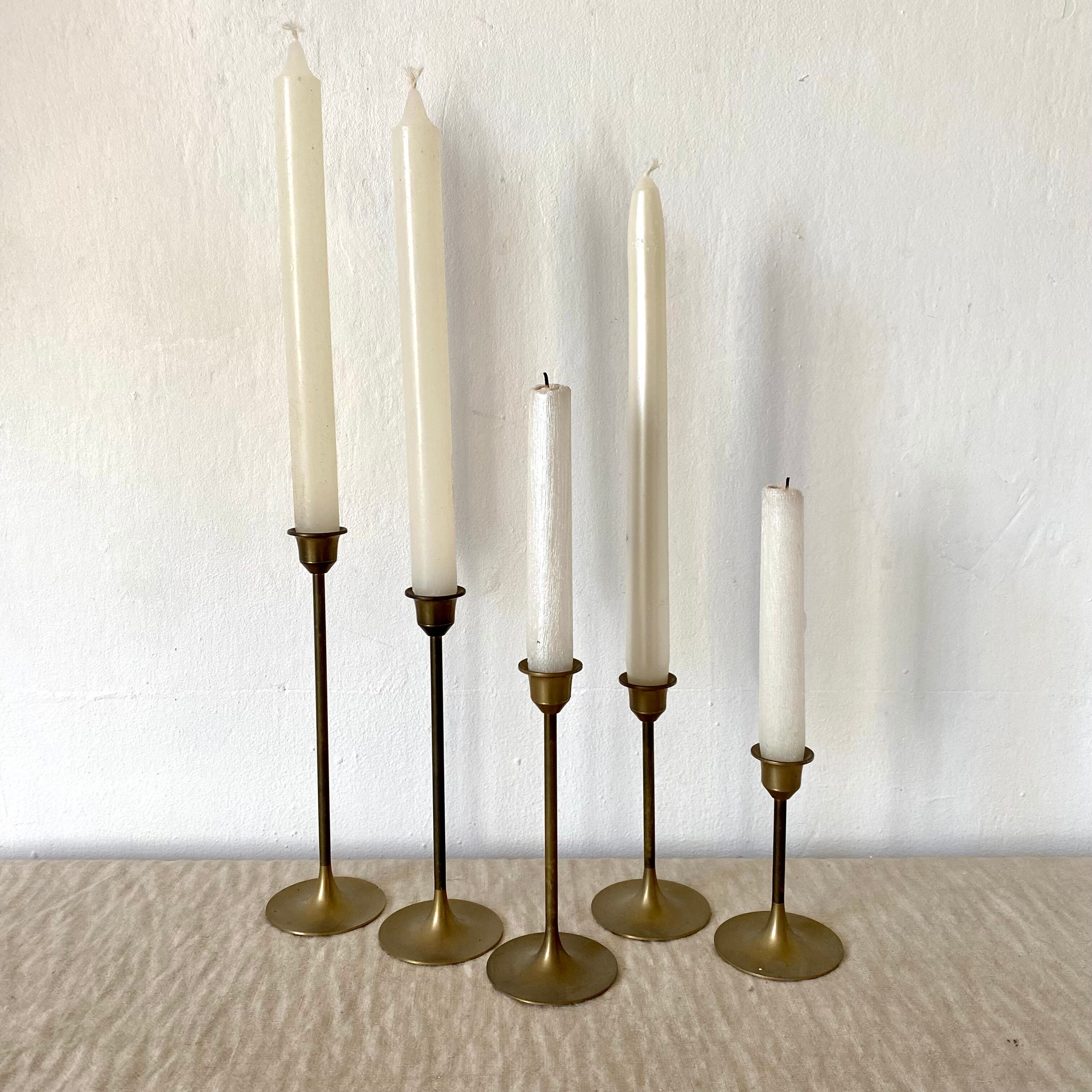 Series of brass candle holders