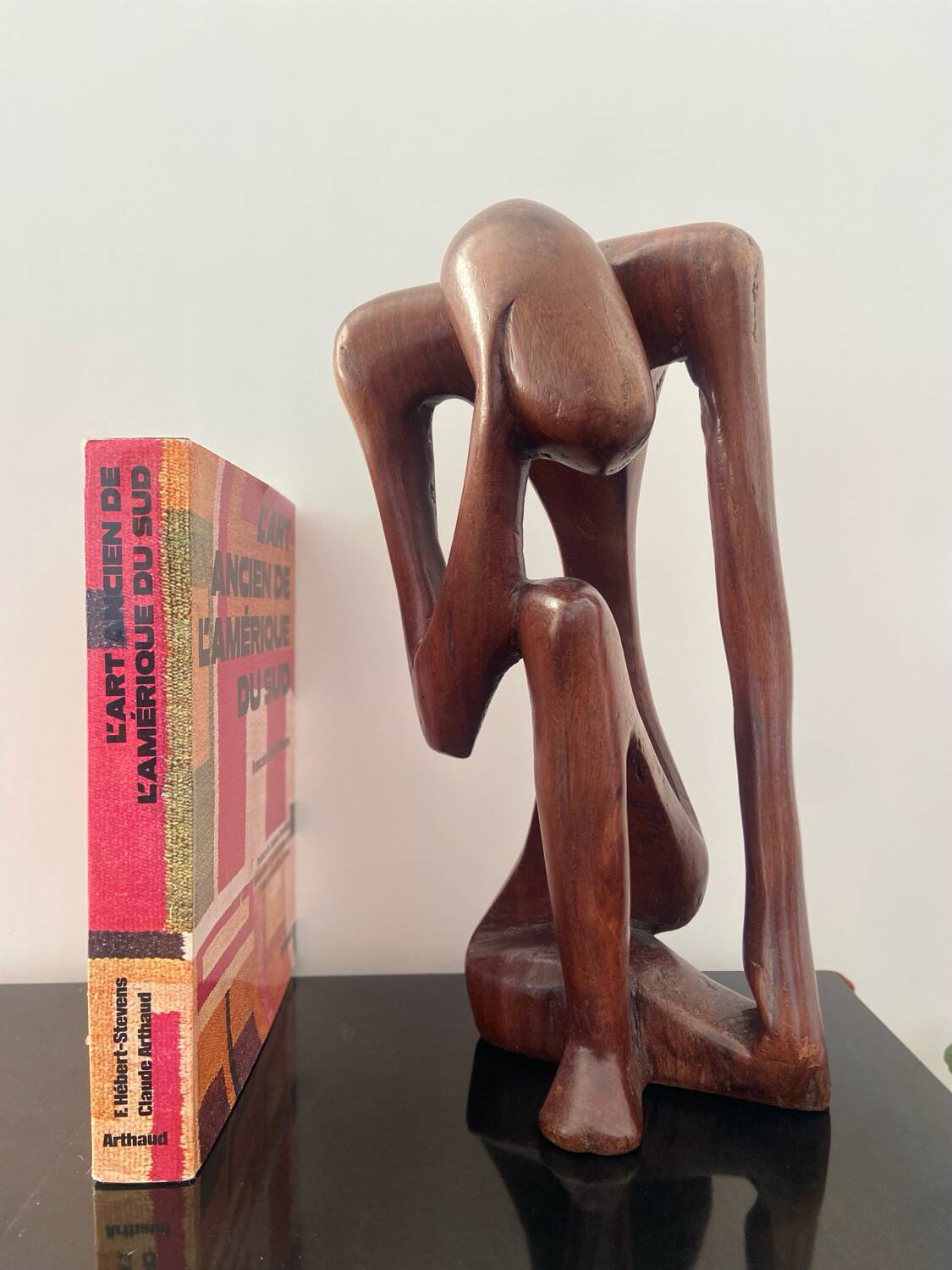 Wooden sculpture the Thinker