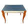 Small wooden coffee table with a mirror from the 1950s.