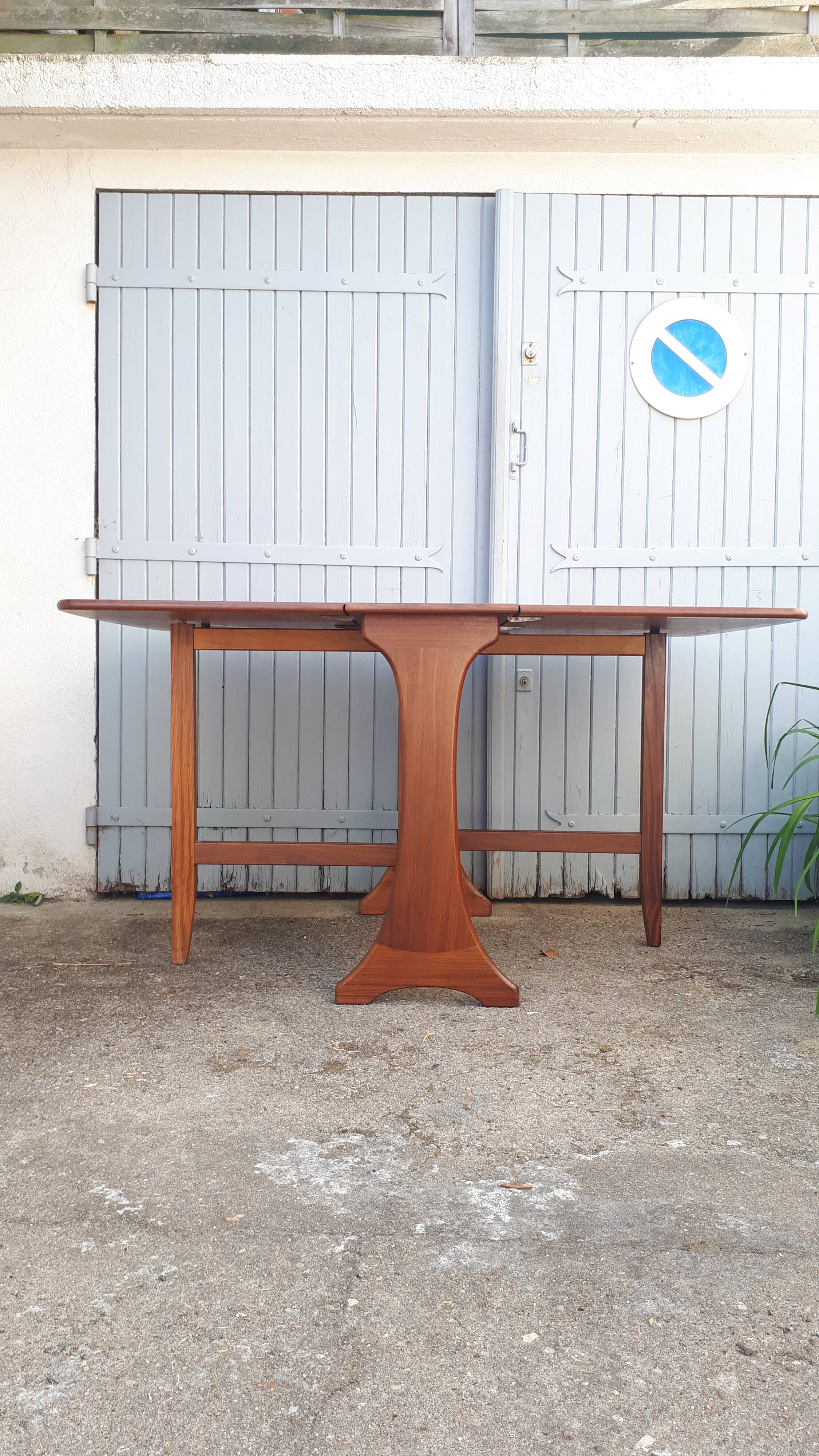 Vintage dining table console desk in teak and exotic wood from the 70s
