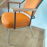 Two-matirere armchair with its footrest