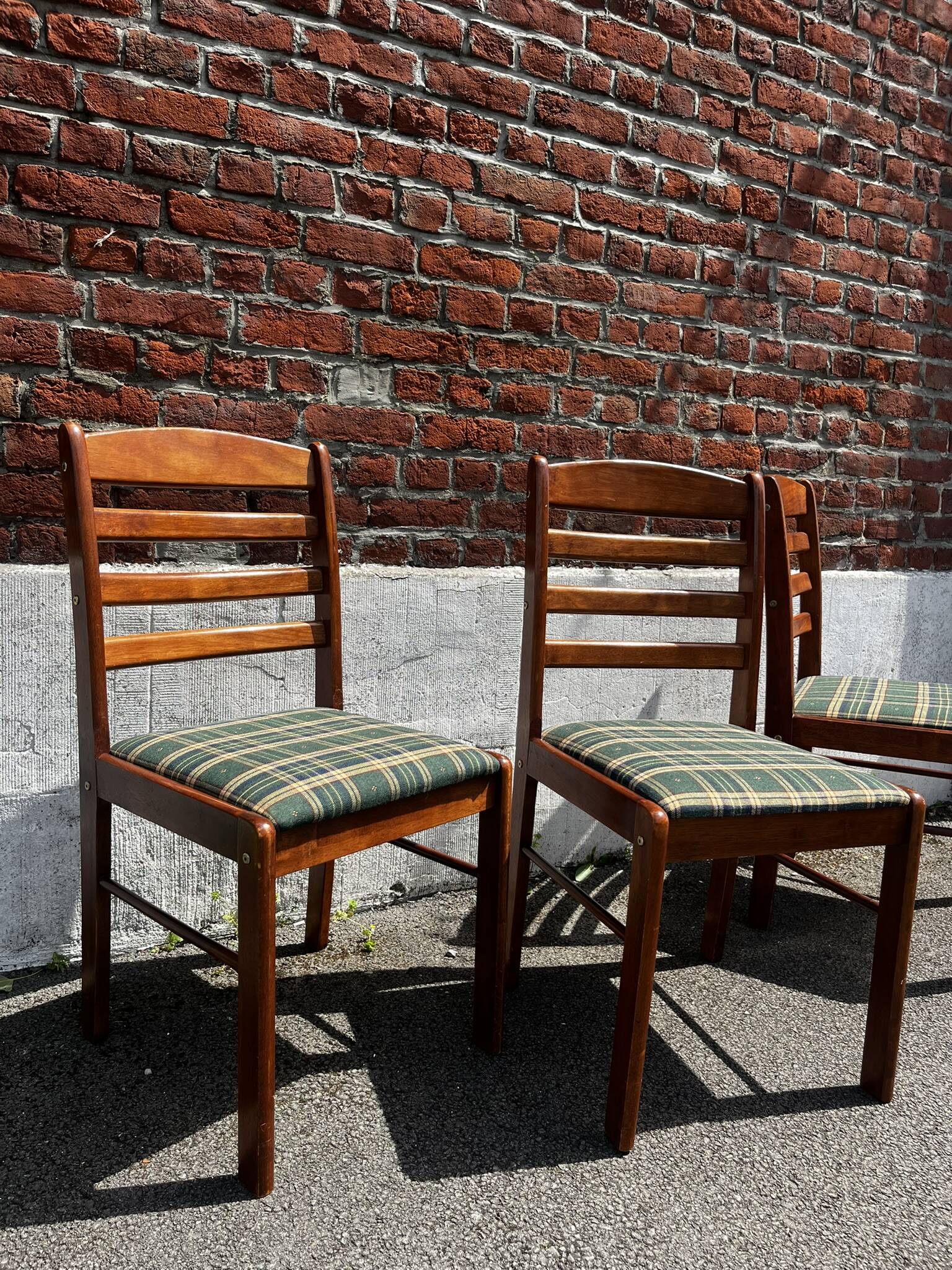 Lot of 3 vintage checkered wood and fabric chairs.