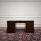 Classic English desk with green leather inlay.