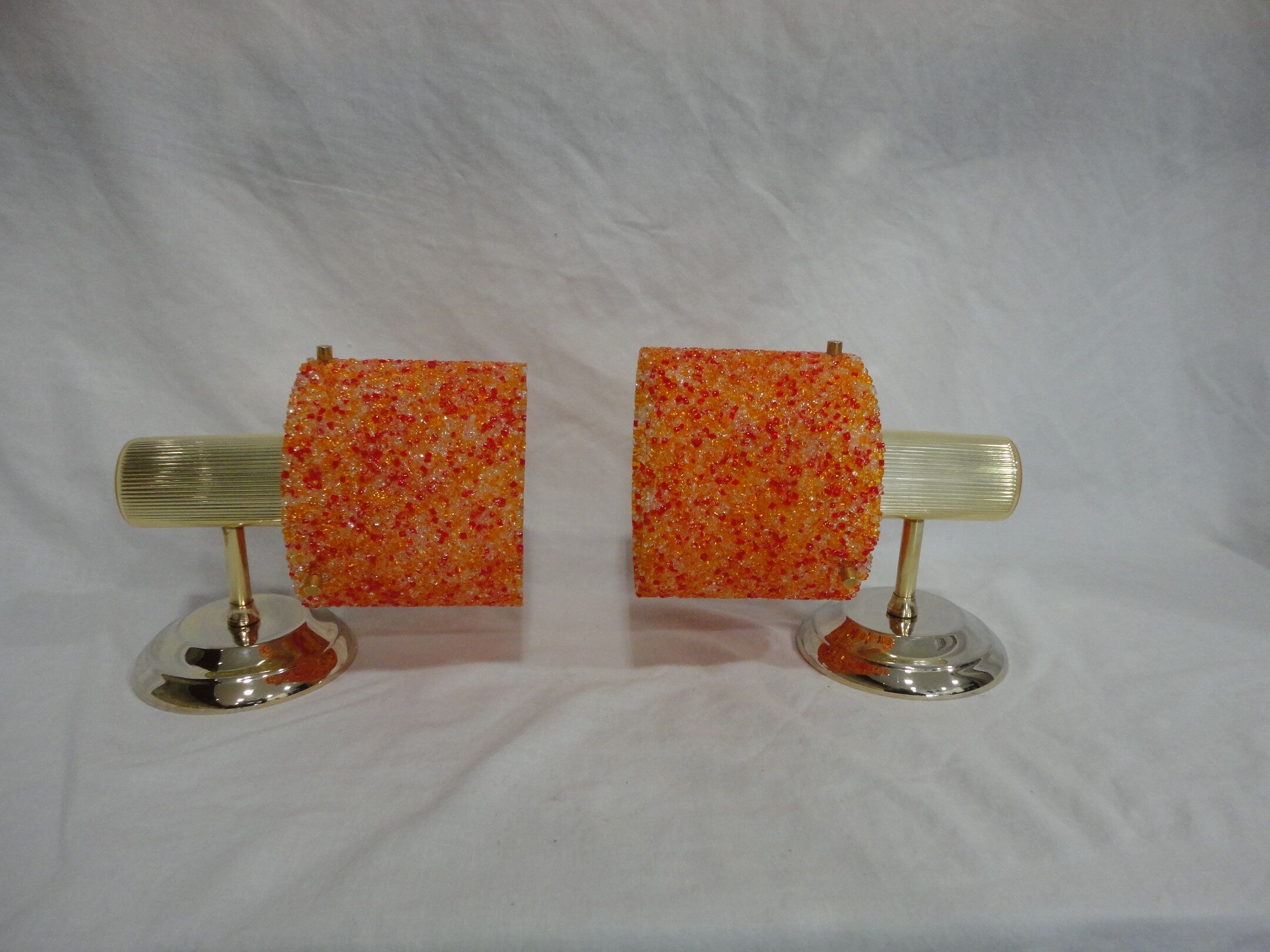 Pair of vintage applique in orange and brass perspex