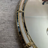 Vintage mirror in solid wood with brass and parcloses.