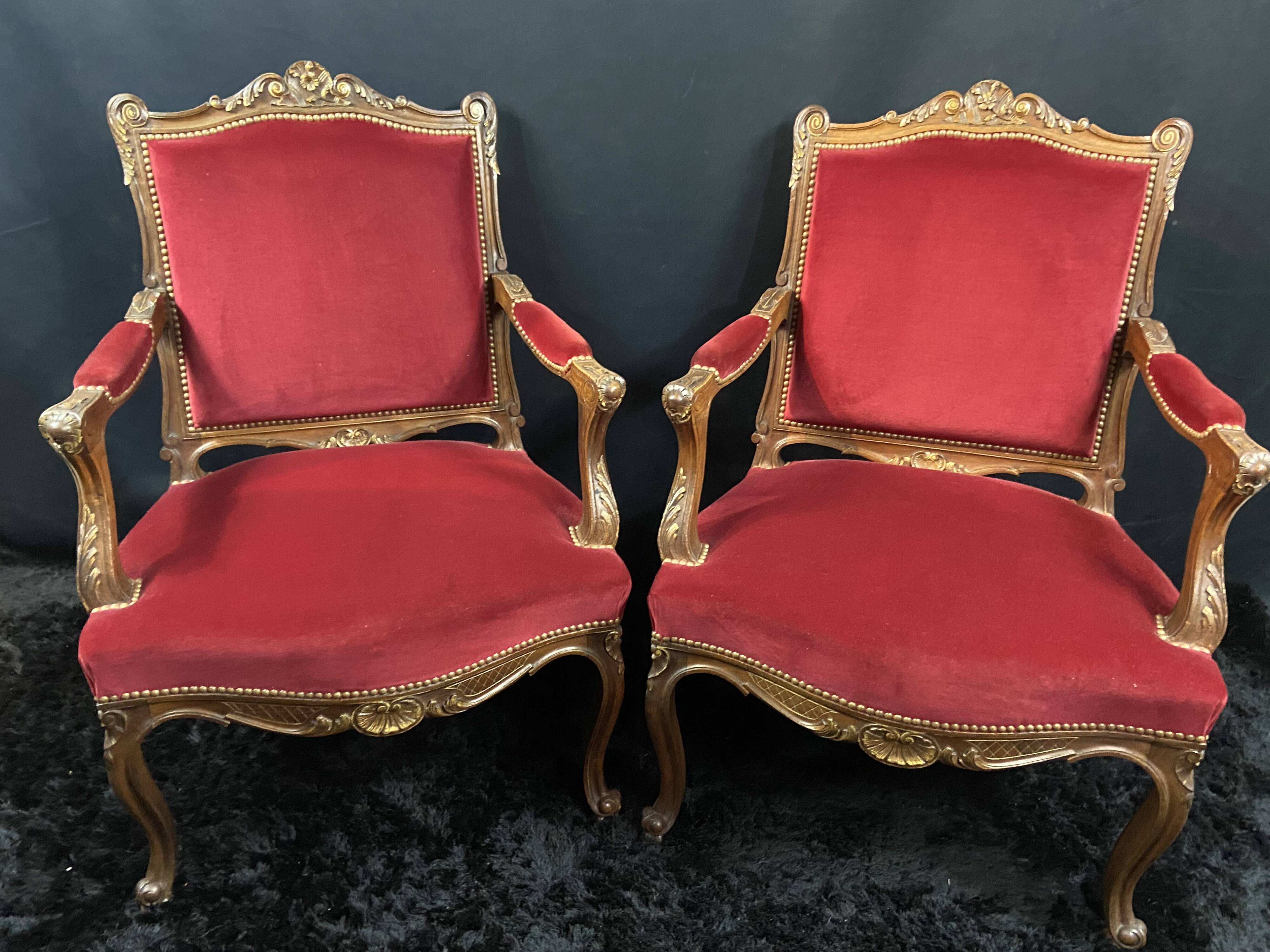 Pair of flat-back armchairs in Louis XV style in red velvet.