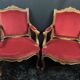 Pair of flat-back armchairs in Louis XV style in red velvet.