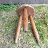 Old vintage wooden tripod milking stool