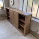 Large row of solid oak loom sliding doors