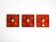 Three beautiful original 1970s Space Age red ceramic wall lamps