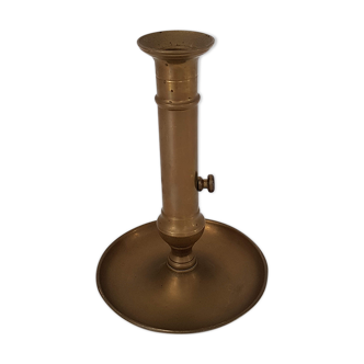 Brass pusher candle holder