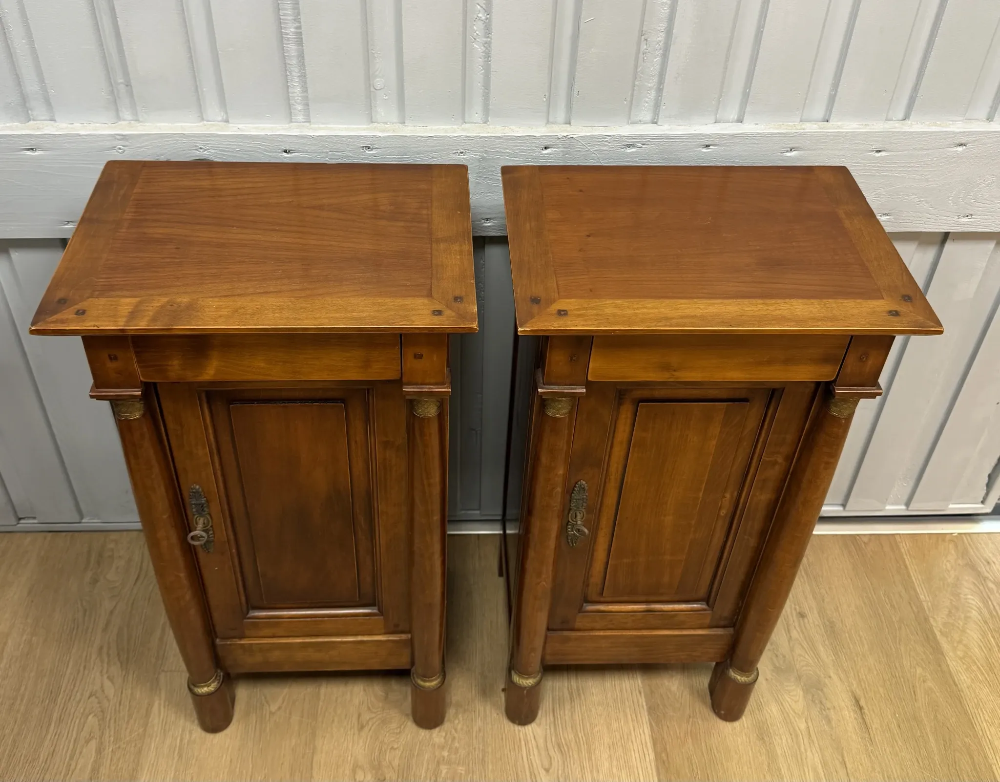 Pair of Empire style bedside tables
