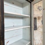 Display cabinet in patinated wood