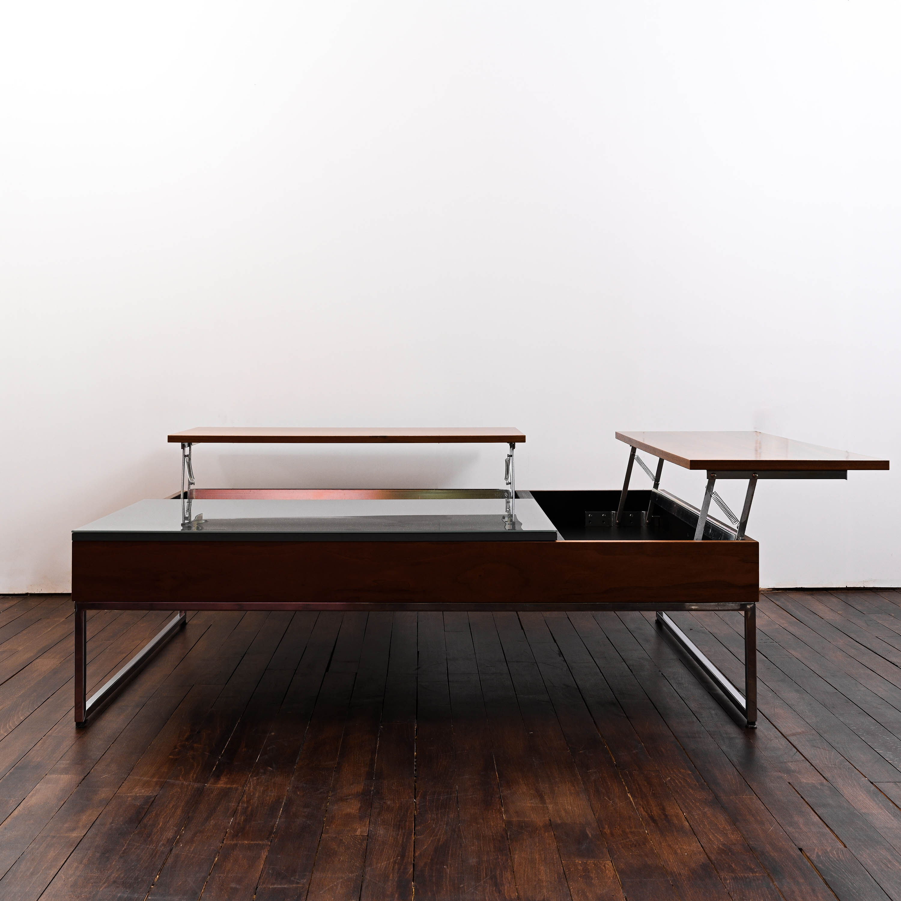 Multifunctional Shiva coffee table with storage and raisable table tops