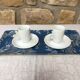 Duo of cups and under cups with white porcelain coffee S-P