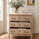 Beautifully crafted Louis XVI style commode in bleached wood.