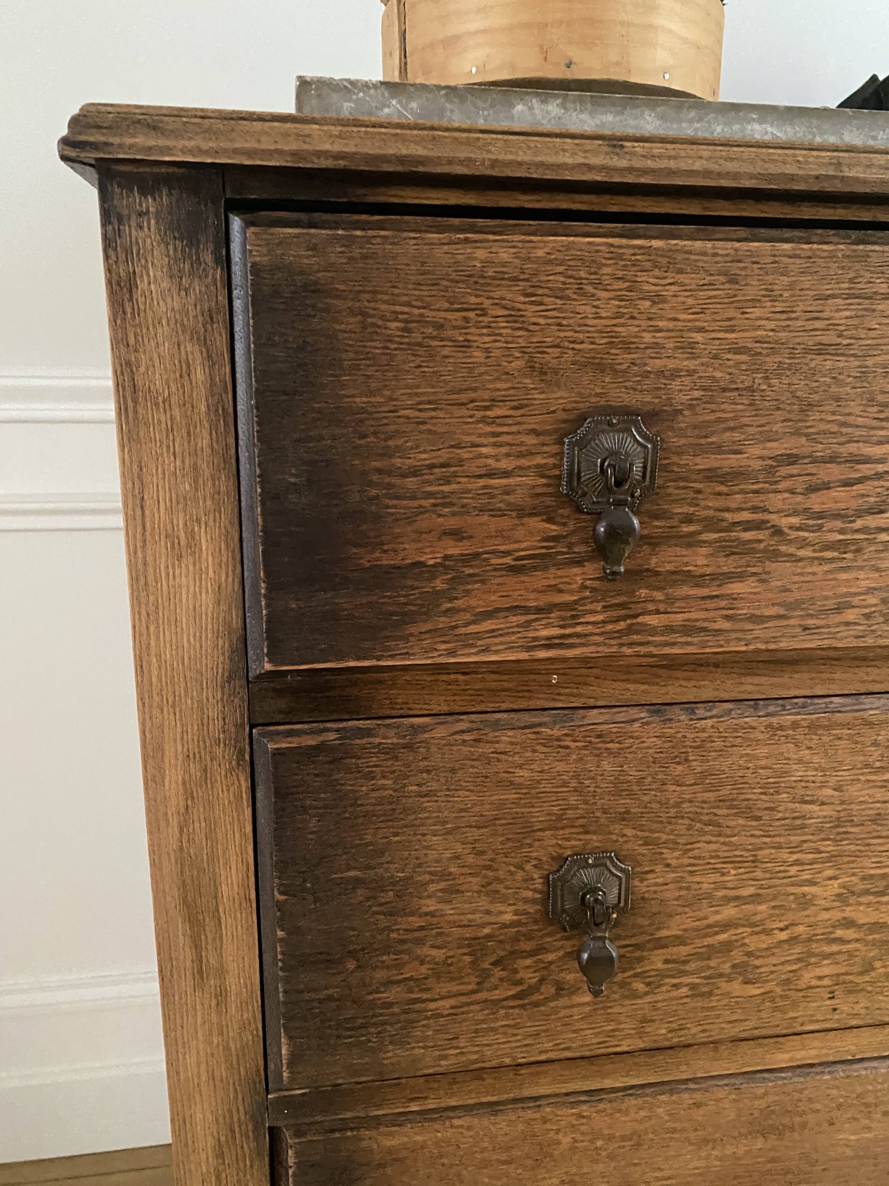 Vintage wooden chest of drawers with three drawers and brown marble top