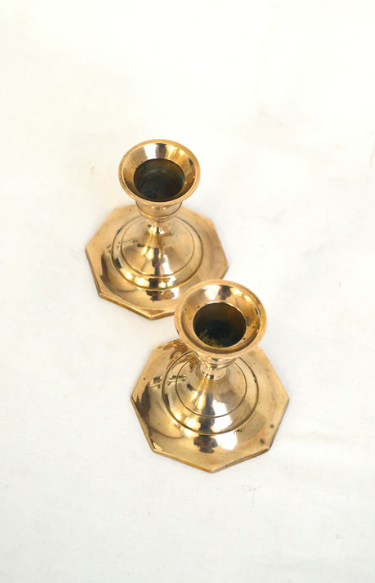 Duo of brass candle holders