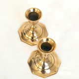Duo of brass candle holders