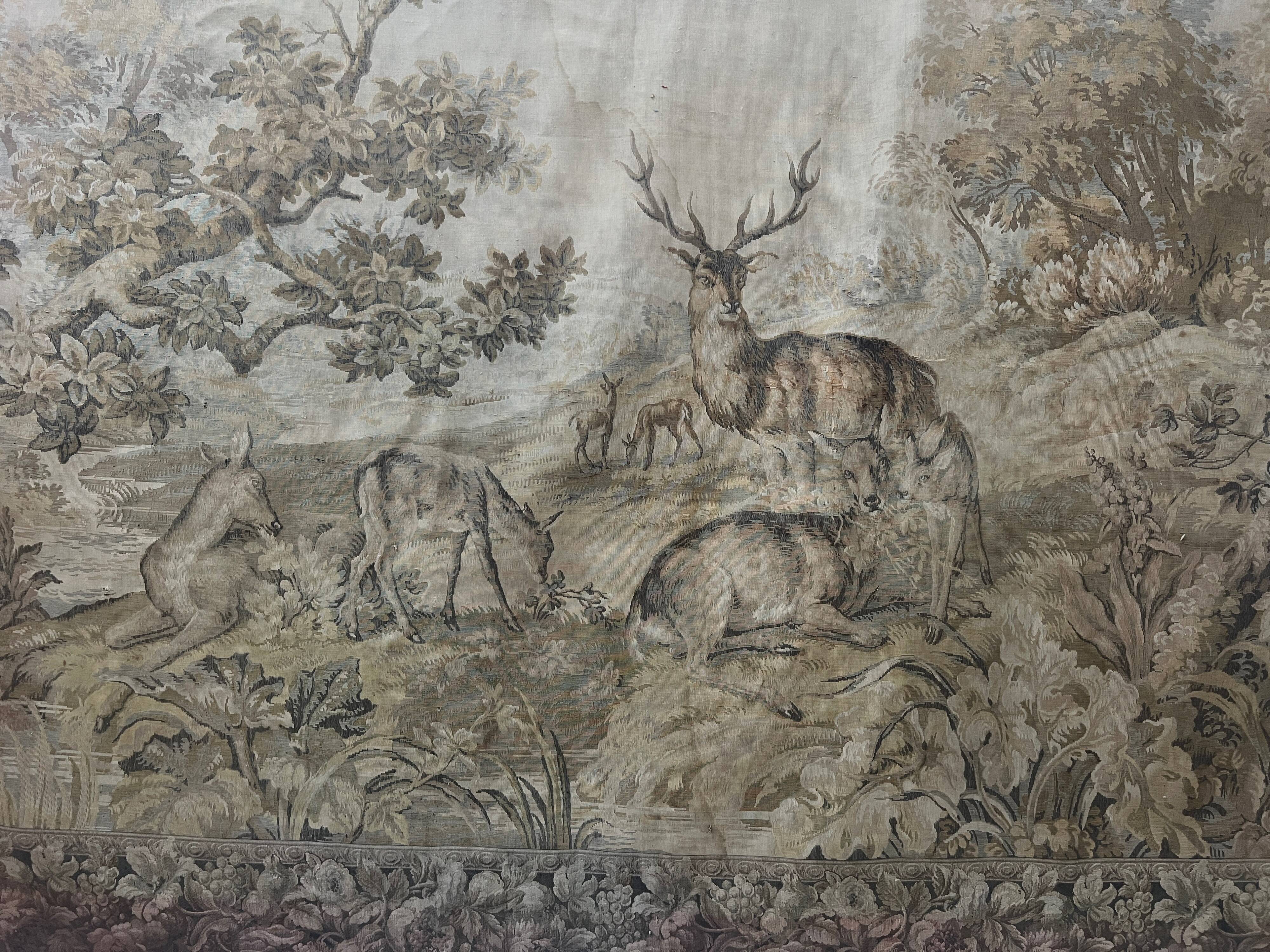 Renaissance-style tapestry with animal motifs, 20th century.