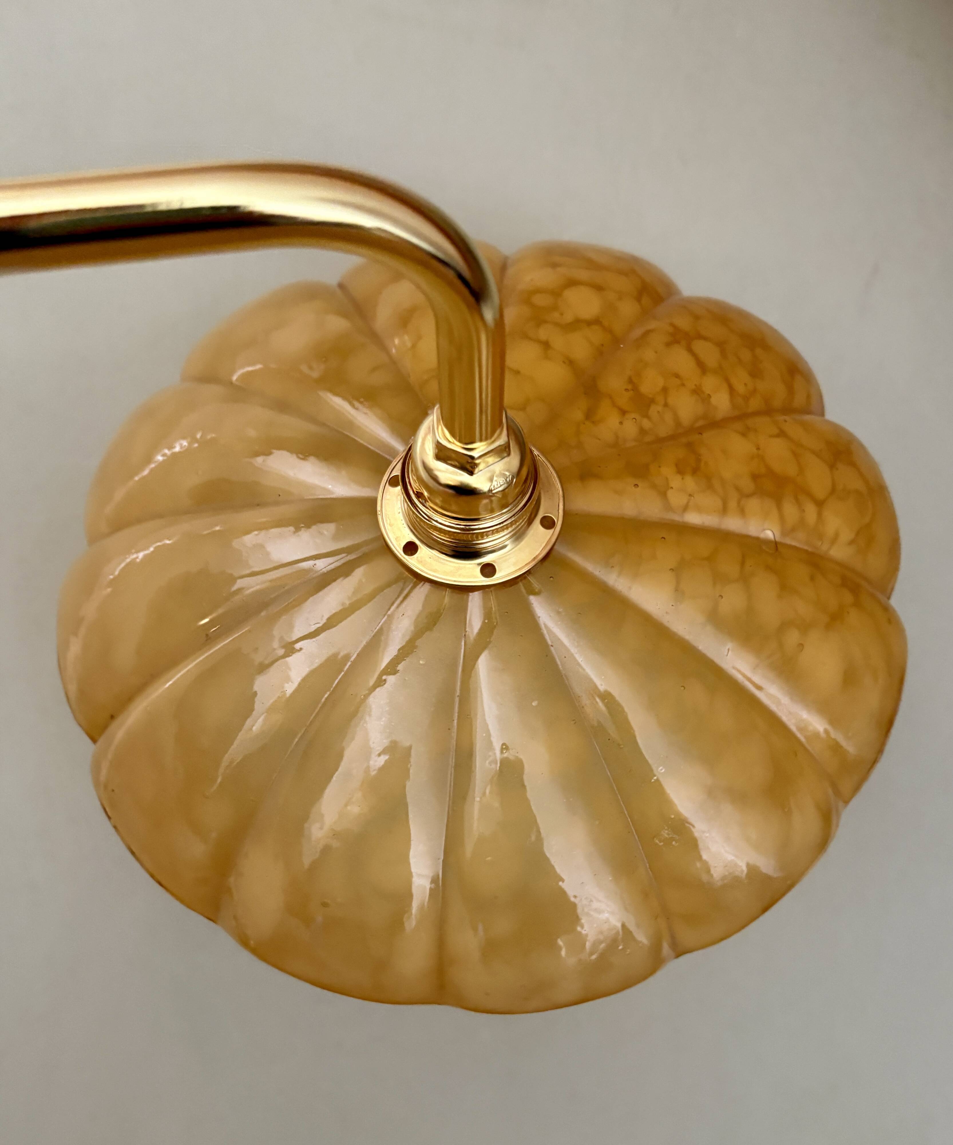 Antique wall lamp with yellow Clichy glass shade