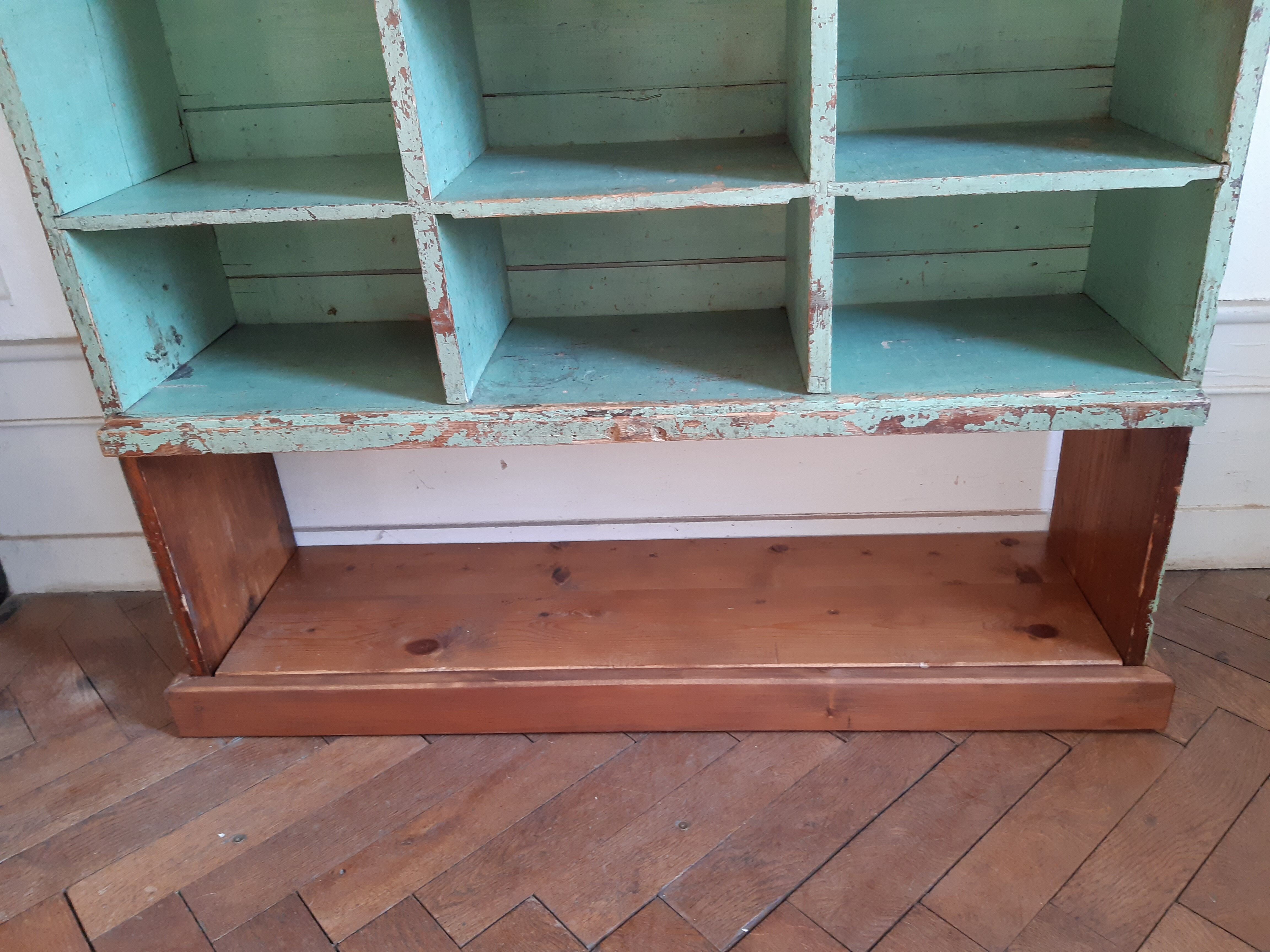 Old library shelf in patinated grocery tree