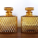 2 yellow glass whiskey carafes