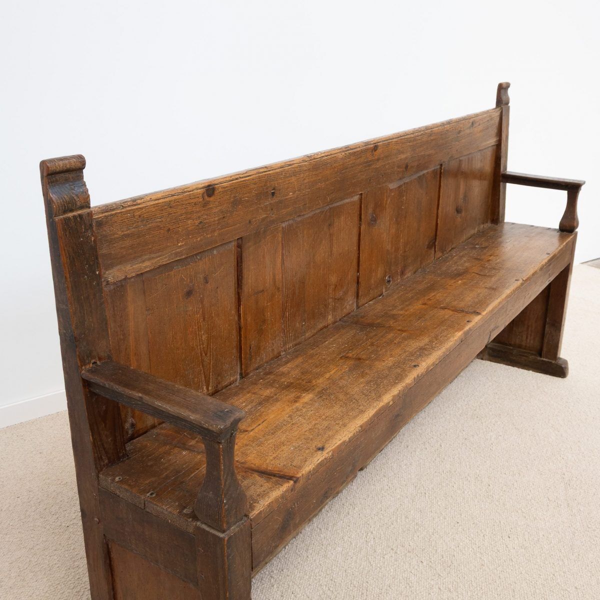 Old wooden bench with panelled backrest – 19th century