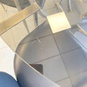 Round dining table - smoked glass & brushed aluminum base