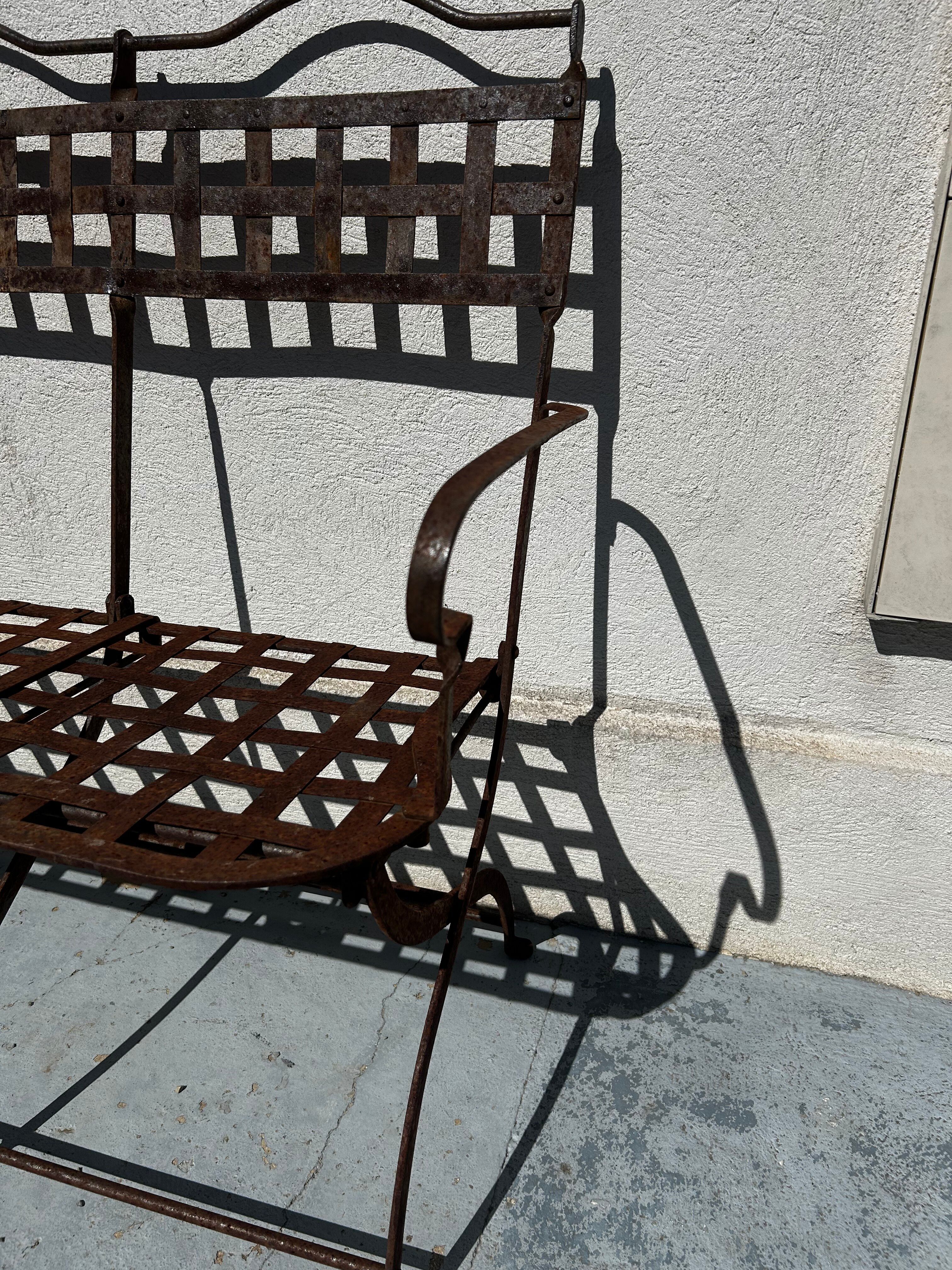 Riveted wrought iron garden bench
