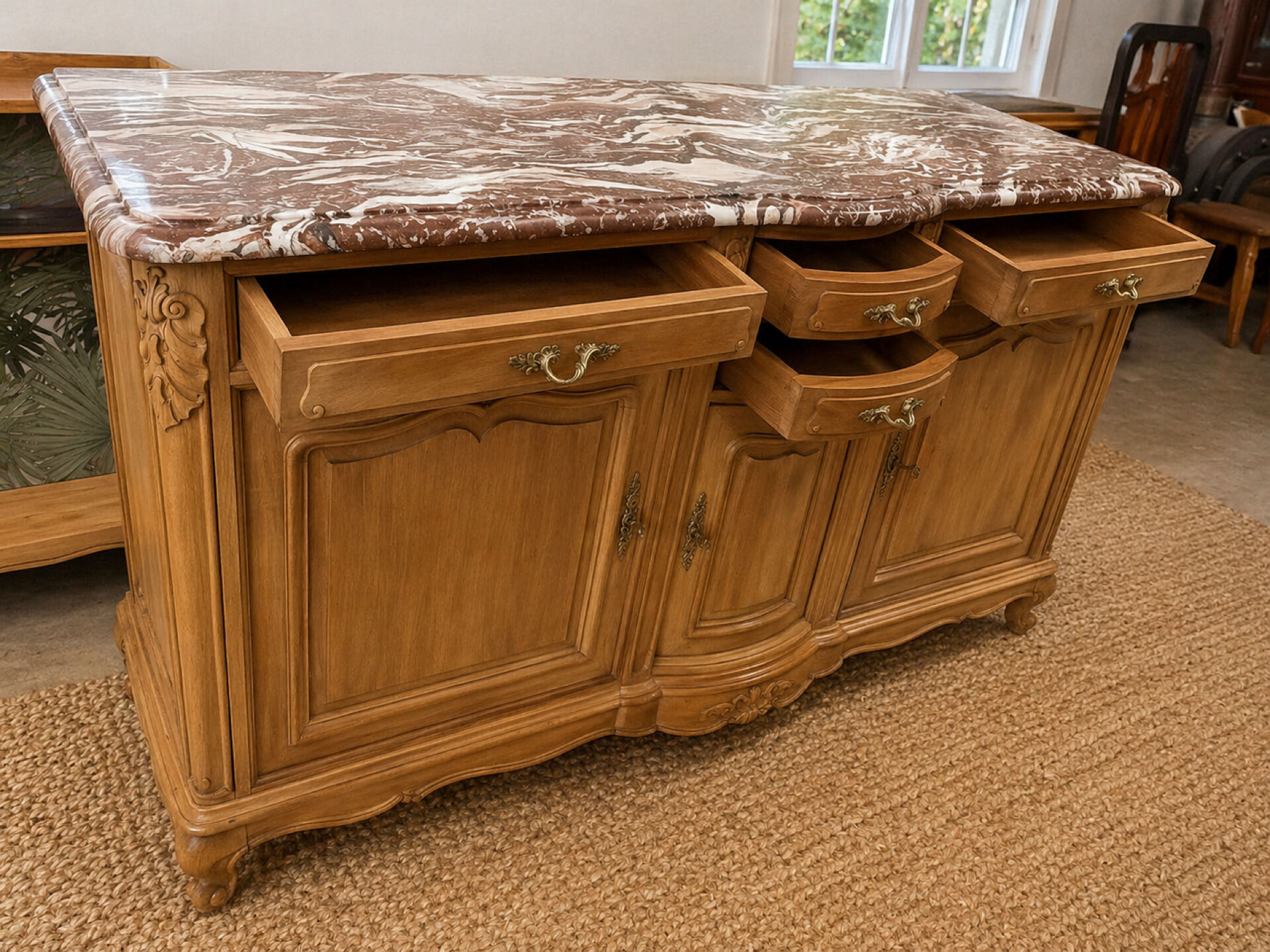 Curved walnut sideboard