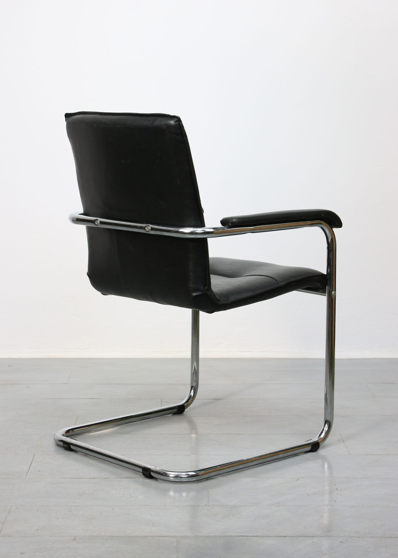 Vintage black leatherette office cantilever chair, 1970s