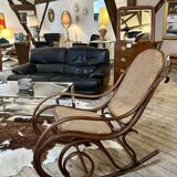 Thonet rocking chair in curved wood and cane from the 1900s