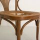 Chaise bistrot avec accoudoirs en bois cintré et assise en cannage