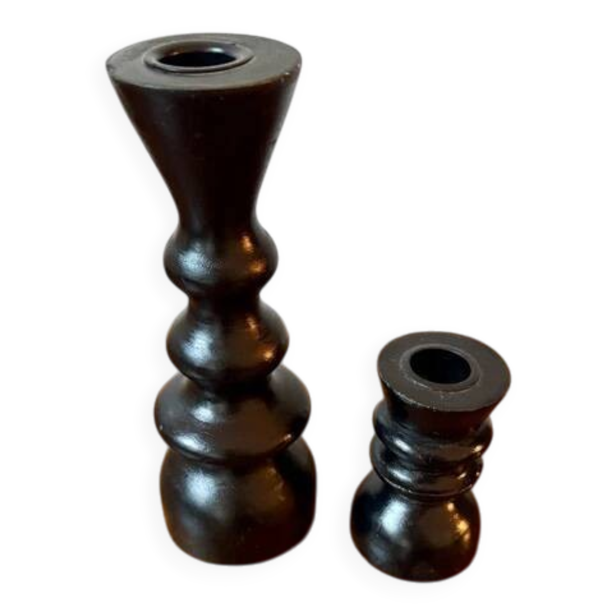Pair of black turned wood candlesticks
