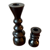 Pair of black turned wood candlesticks