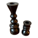 Pair of black turned wood candlesticks