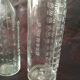 2 old graduated pharmacy bottles