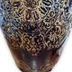 Important Longchamp Griffon vase in golden ceramic
