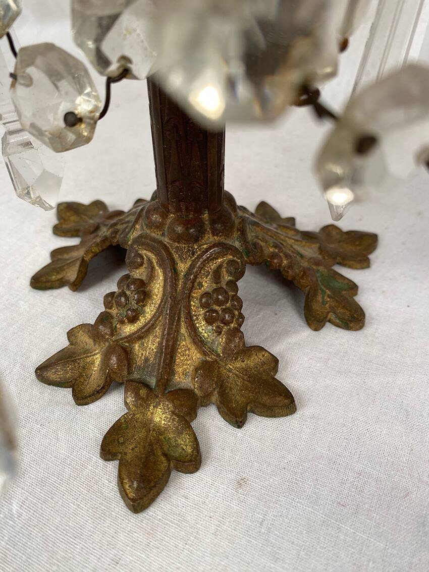 Pair of candlesticks with tassels and flowers in white porcelain