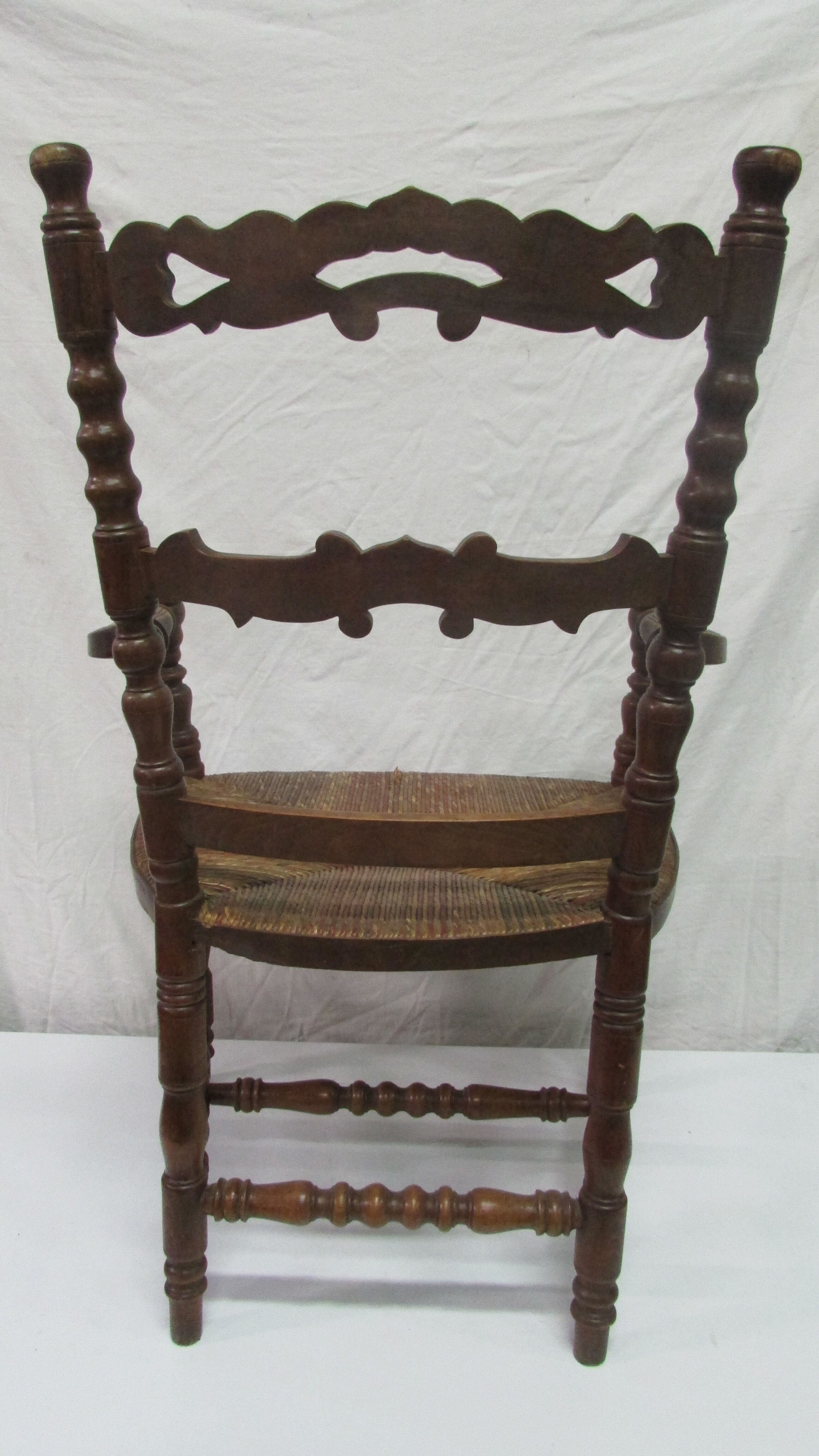 Antique armchair with armrests