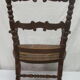Antique armchair with armrests
