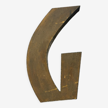 Gold sign letter "G"