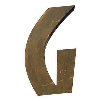 Gold sign letter "G"