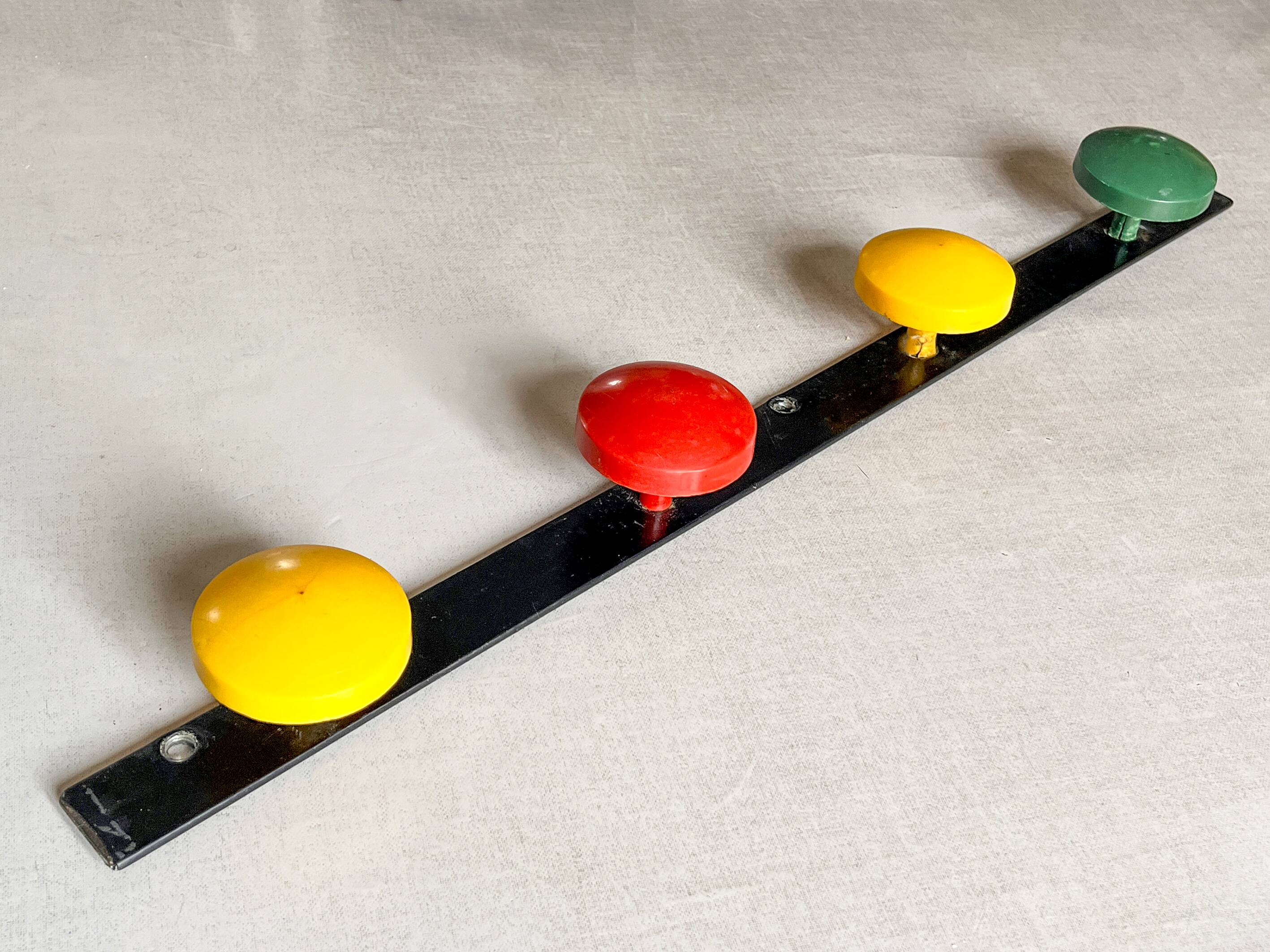 Vintage metal coat rack with colourful plastic hooks, 1960s.