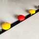 Vintage metal coat rack with colourful plastic hooks, 1960s.